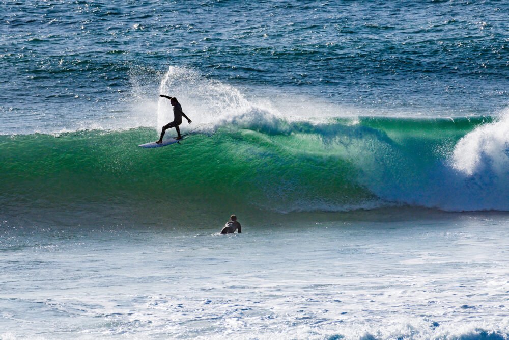 Big waves and surfing after a storm at Swami's Beach in Southern California are beautiful and invite photography