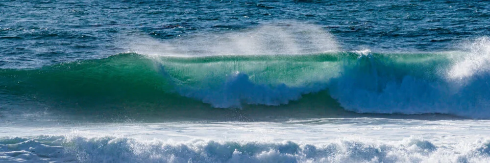 Big waves after a storm at Swami's Beach in Southern California are beautiful and invite surfing and photography.