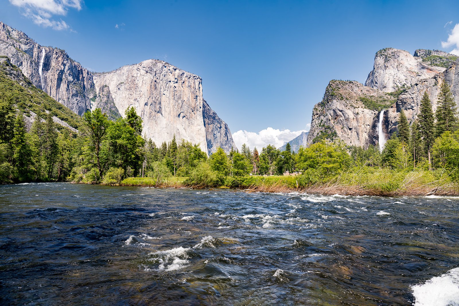 Nature and Spring snowmelts make the Bridalveil and Ribbon waterfalls and the Merced River roaring features of Yosemite National Park