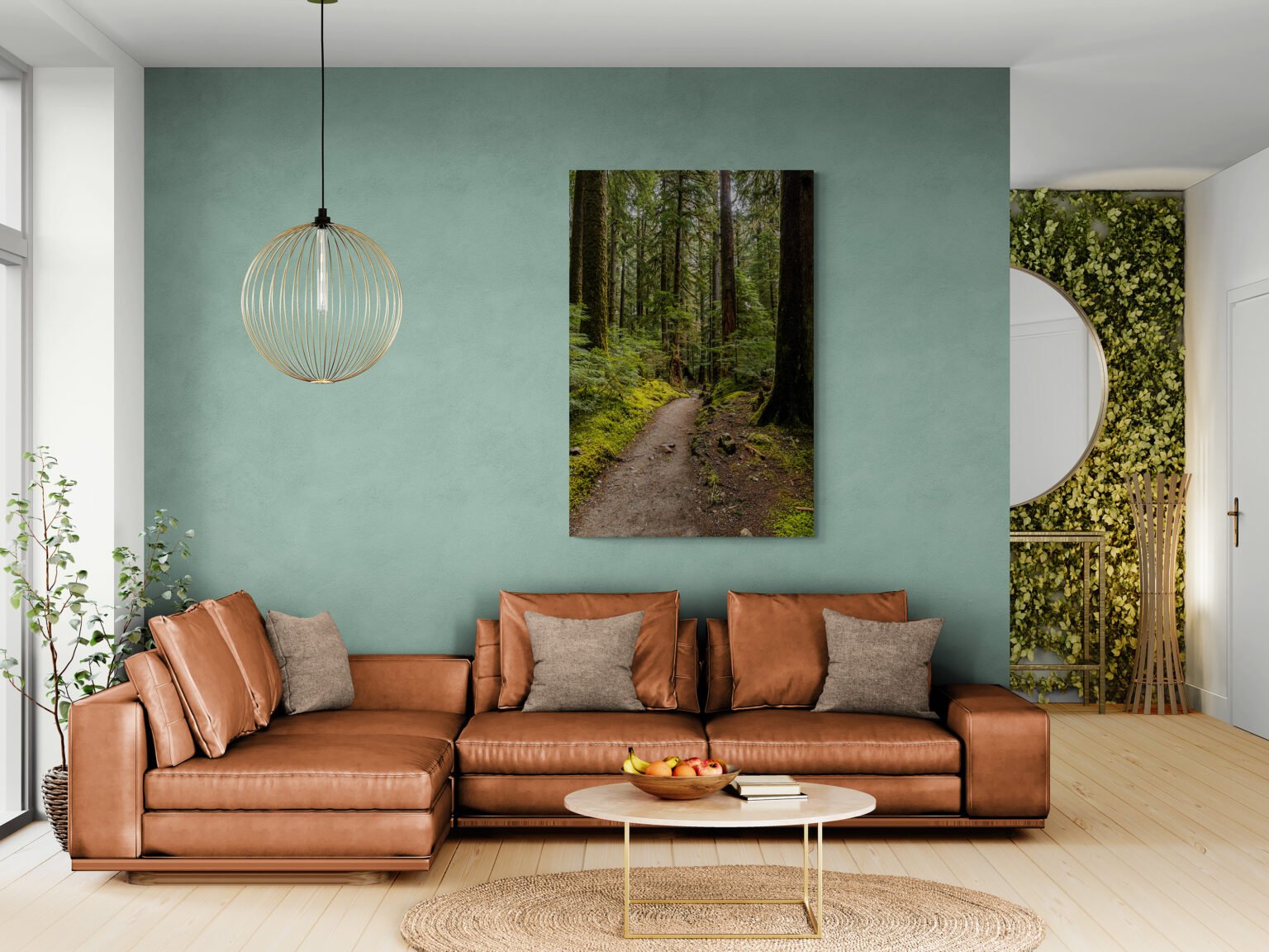 A trail through the nature and wonderous beauty of a rainforest to lead you to Sol Duc Falls in Olympic National Park displayed in a living room with a leather sofa and plant wall.